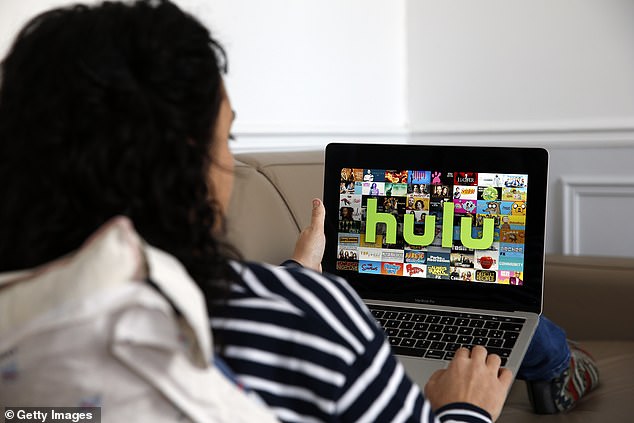 Hulu's logo is seen on a laptop in a photo illustration.  Comcast, the parent company of NBCUniversal, agreed in 2019 to sell its one-third stake to Disney as early as November 1.