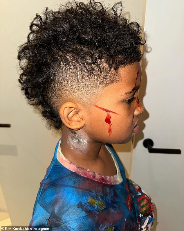 New hairstyle: In addition to snapping images of her son's Halloween costume, the TV personality also debuted Saint's new buzzcut in photos included in the post