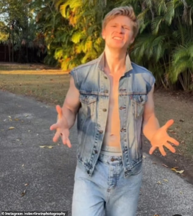 It looked like Irwin was having the time of his life, dressed as the iconic hunk in an unbuttoned denim vest, which he wore shirtless underneath, and matching jeans.