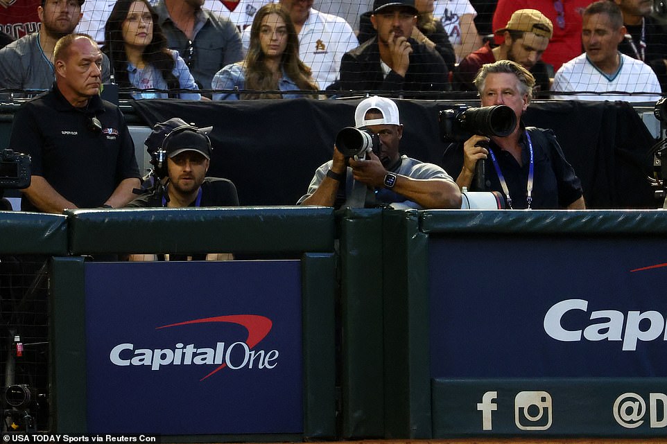 Former Major League Baseball player Ken Griffey Jr.  continues his second career as a World Series game photographer