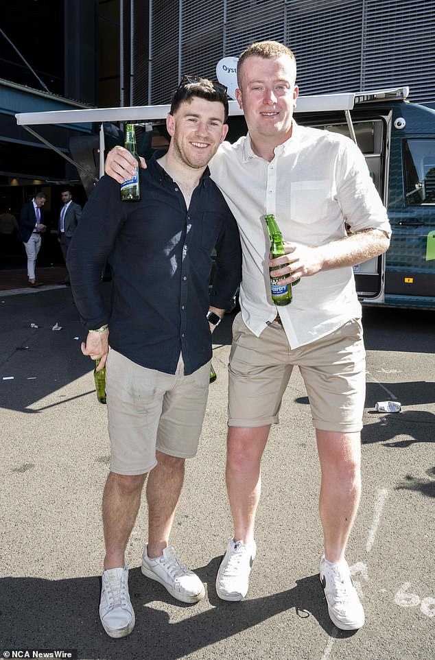 Men have also shown up in a more casual manner - Racing Victoria recently allowed shorts to be allowed in members areas from Melbourne Cup Day - two men pictured at the Everest Cup at Randwick on October 14