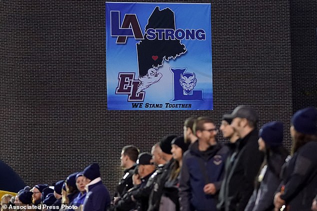 First responders observe a moment of silence for the victims of the Lewiston shooting