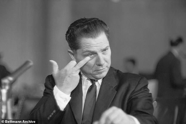 Hoffa makes a pointed gesture as he rubs his face during testimony before the Senate rackets investigation, overseen by Bobby Kennedy, his archrival