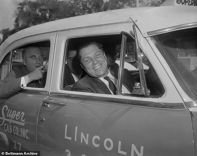 Hoffa is seen beaming as he leaves court after being acquitted by the Senate Rackets Committee