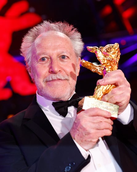 Nicolas Philibert with his Golden Bear for On the Adamant at the Berlin Film Festival.