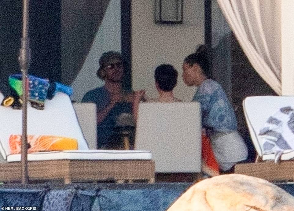 Family time: The couple was seen outside with their eldest child