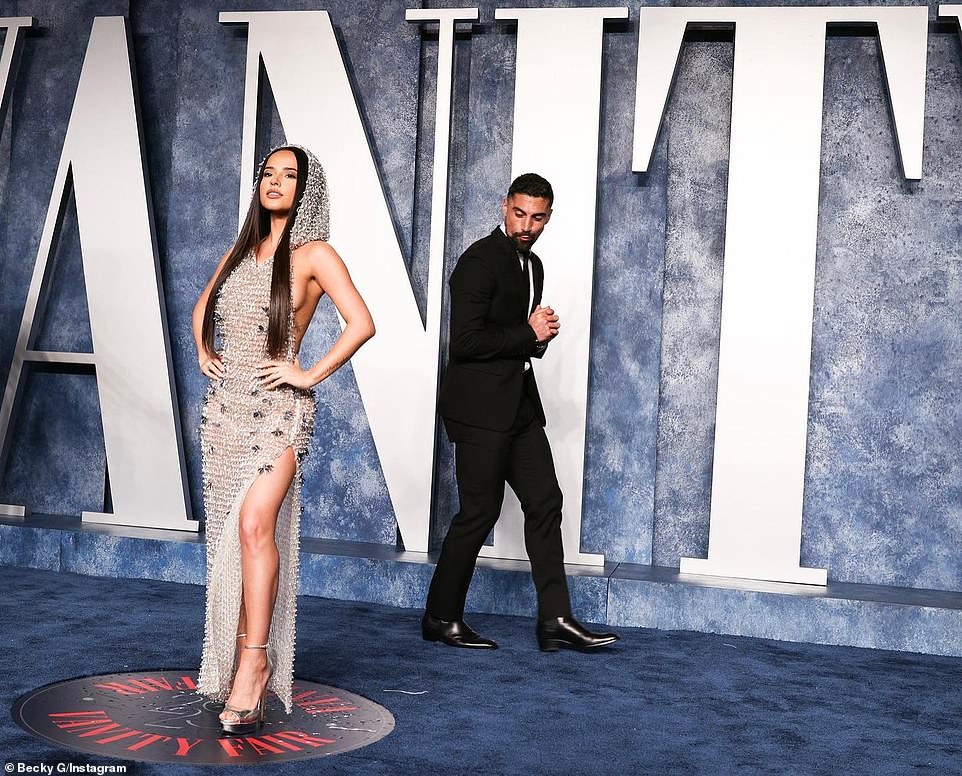 Coy couple: The 2ndo Chance singer hasn't been physically pictured with the 31-year-old athlete (R) since they attended the Vanity Fair Oscar Party on March 12, but they still follow each other on Instagram