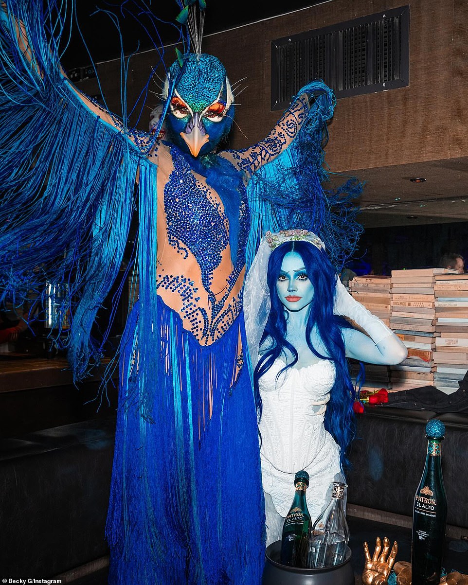 'So much fun to celebrate!'  Hours earlier, Becky G wore a custom LAROXX costume to transform into Corpse Bride for Heidi Klum's (L) 22nd annual Halloween party at Marquee in Manhattan's Chelsea neighborhood