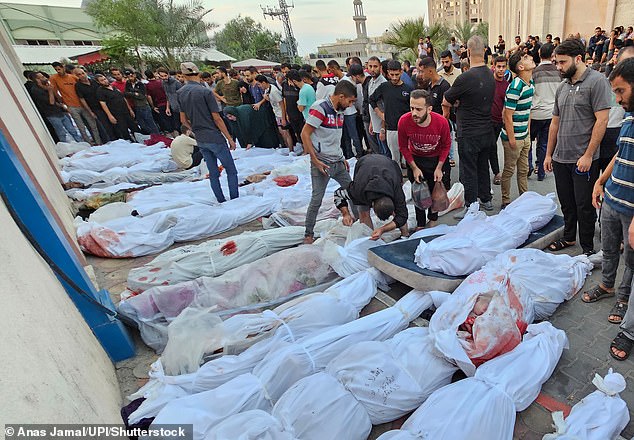 Palestinians mourn their victims after Israeli airstrikes on the Jabalya refugee camp in northern Gaza Strip killed more than 50 people on Tuesday