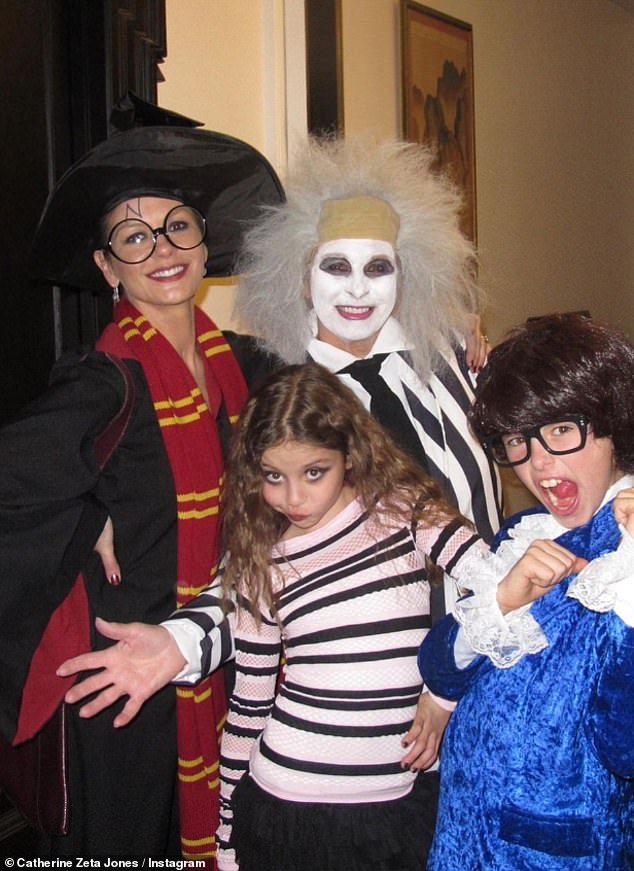 Fun times: Another photo also showed Catherine dressed as Harry Potter as she posed for a playful photo with her children