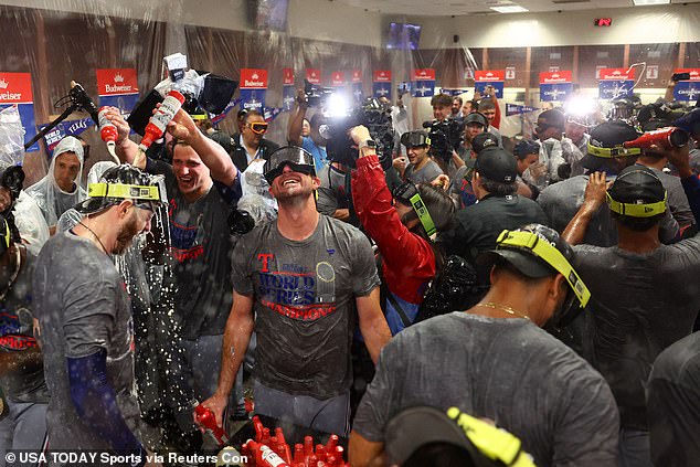 The Rangers also all wore commemorative T-shirts to mark their historic victory