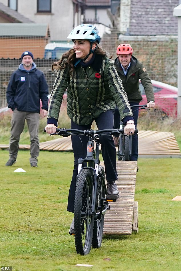 By bike!  The Princess of Wales, known for her sporty and competitive nature, donned a helmet as she took part in mountain bike training