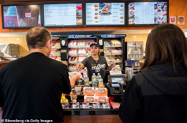 Customers who are not part of the loyalty program have the option to sign up online or through their phone app.  They can also try one of Dunkin's new holiday drinks for a limited time