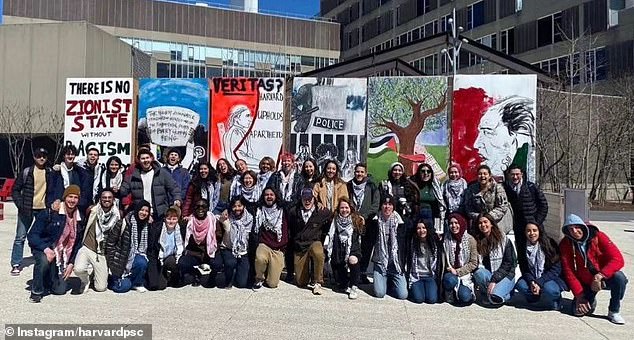 Members of the Harvard Palestine Solidarity Committee protest for the liberation of Palestine.  Since releasing the statement, the group has claimed they have been unfairly targeted and has appealed for support