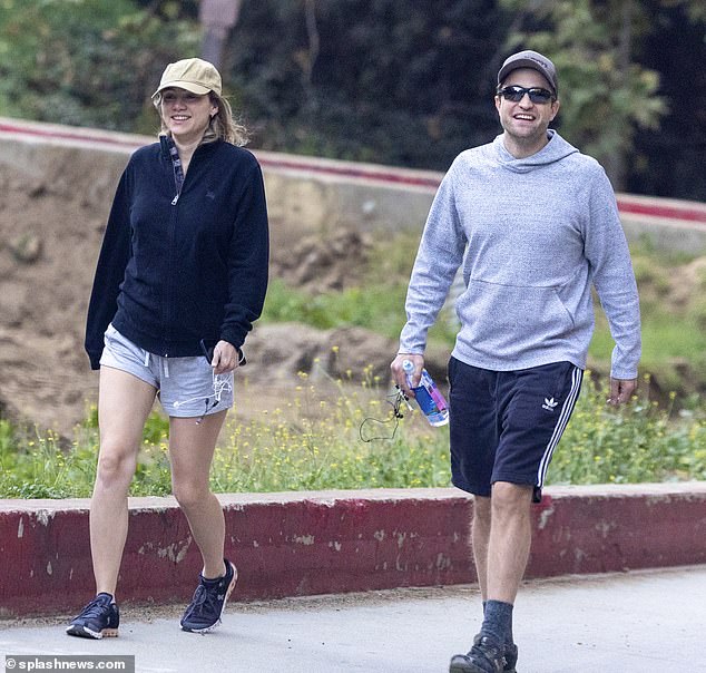 Cute: The happy power couple laughed together