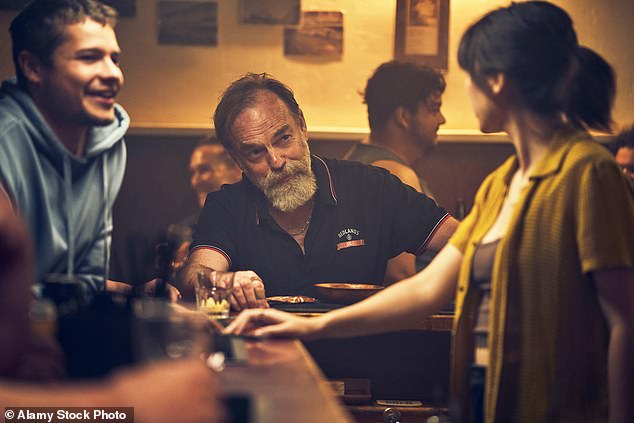 The Royal is run by a dissolute drunkard named Billy (Hugo Weaving, pictured) who gives them a few basic tips on how to serve the regulars, preferably with some cleavage.  After that, they're more or less on their own.