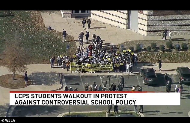 About 50 to 100 students walked out of class Wednesday afternoon in protest of the policy