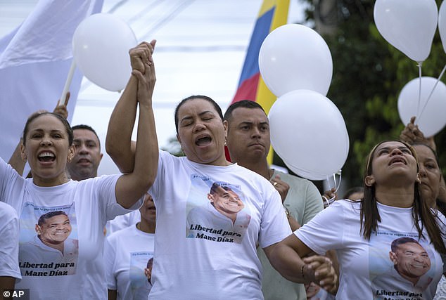 Diaz's mother (center) was also kidnapped before being released later on Saturday