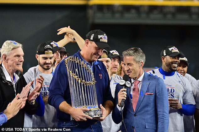 Texas Rangers General Manager Chris Young celebrates winning the World Series