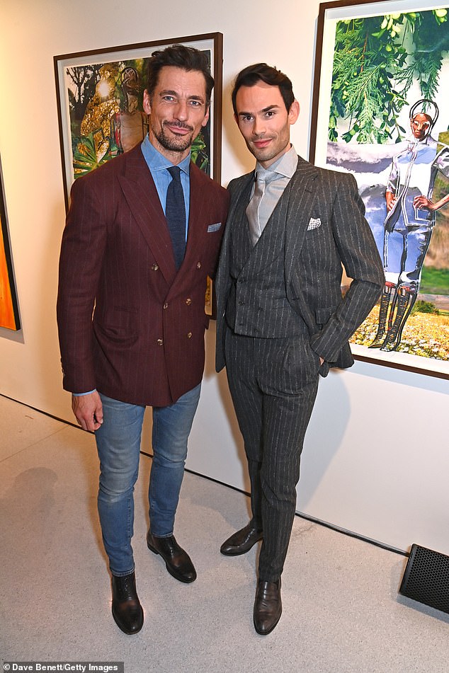 Two's company: David posed for photos alongside Made In Chelsea star Mark-Francis Vandelli