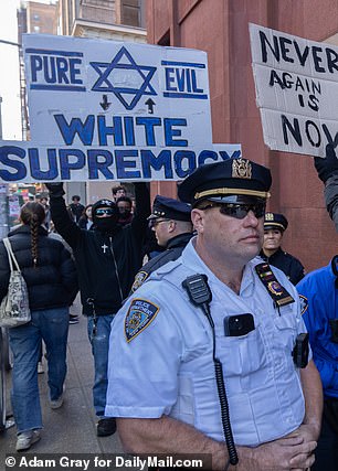 He tore off the word Jewish so that his sign read “white supremacy.”