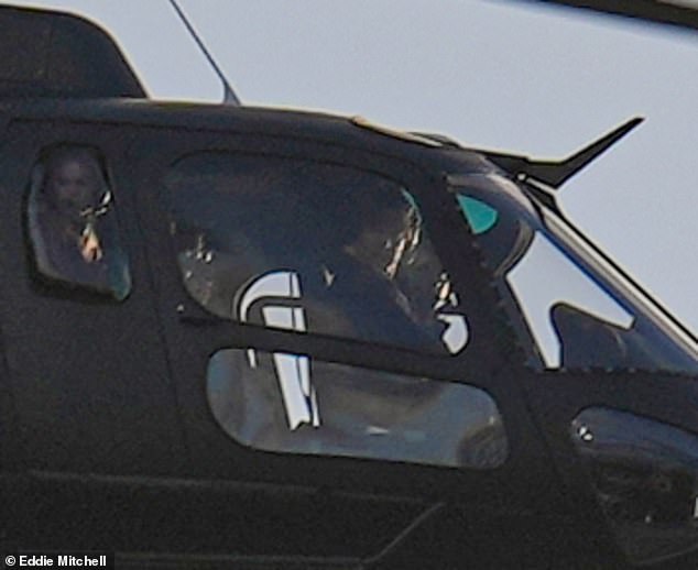 The Mission Impossible star took to the skies in a black helicopter as he flew out of the Scientology Continental Liaison Office & Commodore's Messenger Organization in East Grinstead, Sussex.