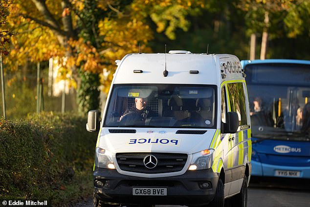 Pictured: Police outside Scientology headquarters in Sussex today