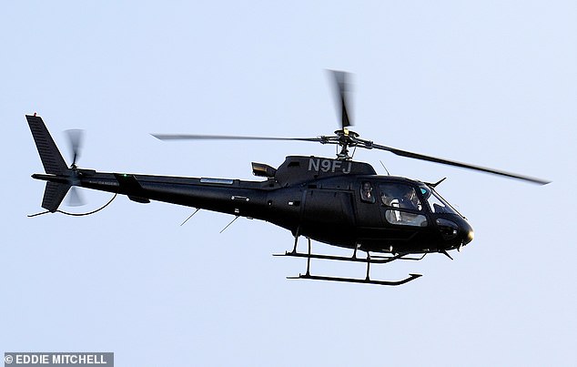 Tom Cruise was pictured leaving headquarters today in a black helicopter