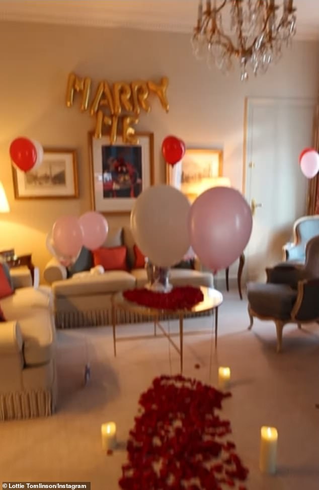 Balloons and marry me?  gold balloon helped create the romantic setting