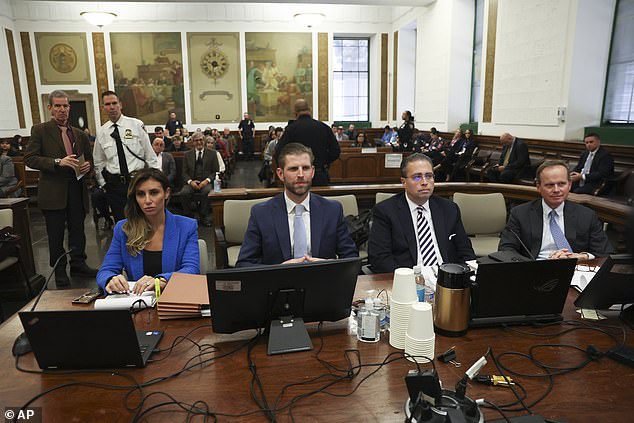 Former President Donald Trump's son and co-defendant Eric Trump, second from left, and attorneys, from left, Alina Habba, Clifford Robert and Christopher Kise attend the Trump Organization civil fraud trial