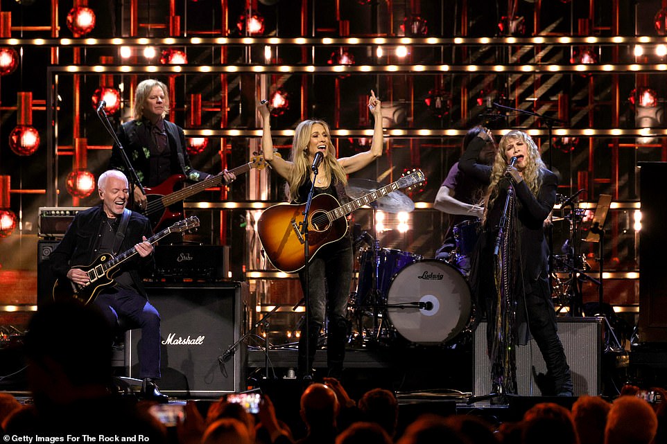 Rocking: Peter, Sheryl and Stevie perform on stage