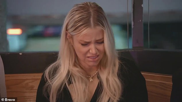 Sad: In another scene, Ariana looks very sad as she sits in a restaurant booth