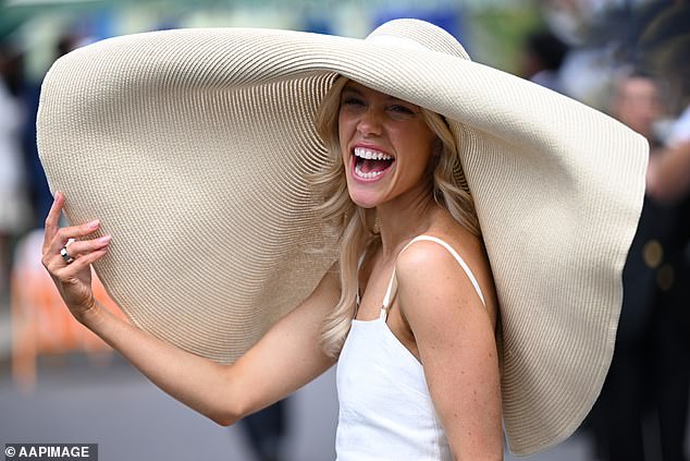 This glamorous racegoer turned heads with her hat along the track at Flemington