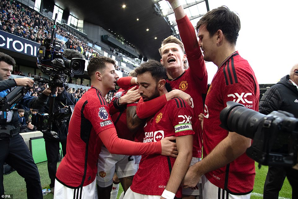 United's players celebrated after Bruno's big goal gave them all three points following an outright 3-0 defeat