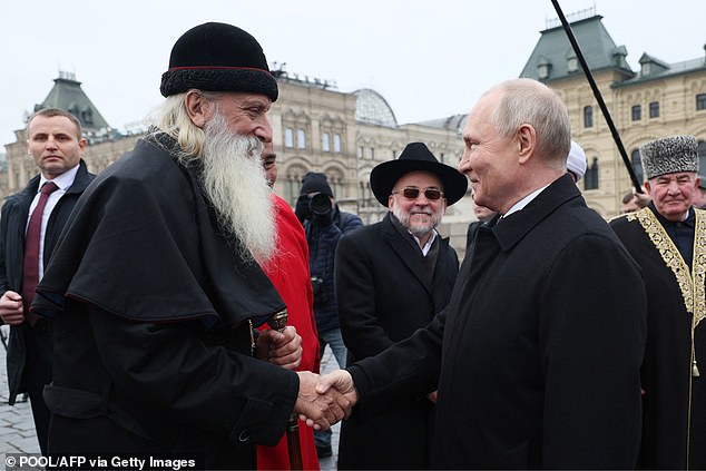 Putin talks to the head of the Russian Orthodox Old Believer Church Korniliy (photo left)