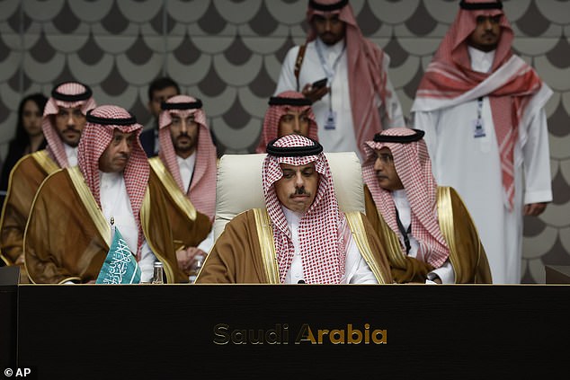 Saudi Foreign Minister Faisal bin Farhan Al Saud (center) attends a meeting with US Secretary of State Antony Blinken