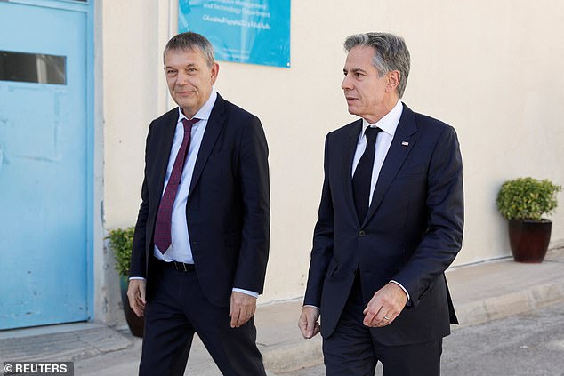 US Secretary of State Antony Blinken (right) walks with the UN Relief and Works Agency for Palestinian Refugees in the Near East Commissioner General Philippe Lazzarini (left)