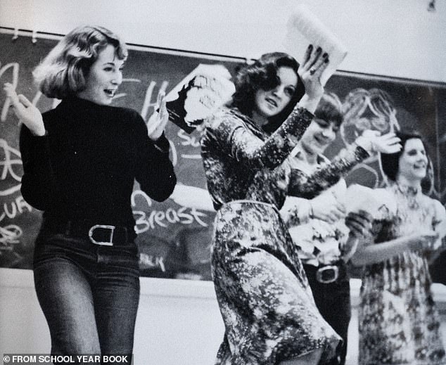 Back as a brunette: As a child growing up in the Detroit suburbs, Madonna – pictured at her high school in Rochester Hills – was entranced by Motown