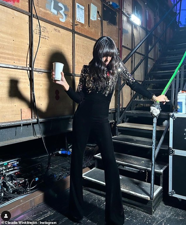 Caffeine kick: Claudia, 51, dazzles in a black flared velvet jumpsuit.  The presenter shared a photo from behind the scenes on Instagram before the live show