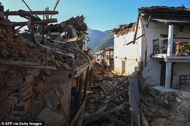 Soldiers could be seen trying to clear the roads blocked by landslides caused by the earthquake