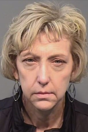 Hancock is no longer a judge as part of her sentence.  She is pictured in her DUI mugshot