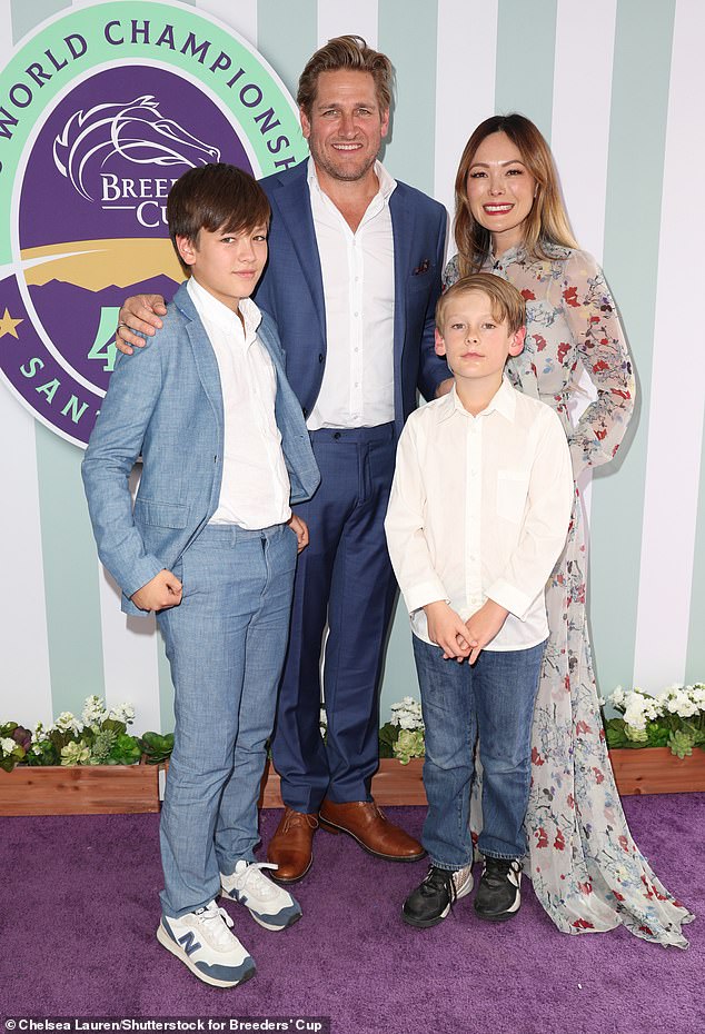 At times the couple were joined for photos by their two sons Hudson, 11, and Emerson, nine (both pictured)