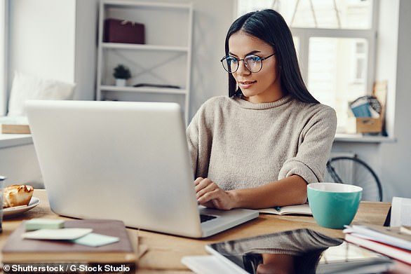 One in five professionals in Australia who work from home could be deprived of bonuses and promotions if companies start rewarding those who come into the office (pictured is a stock photo)