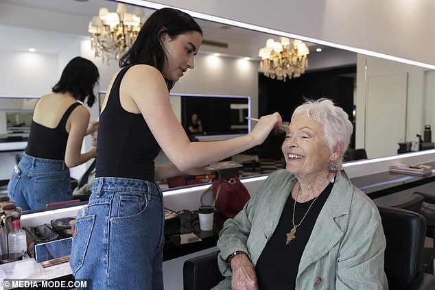 The British-born star looked focused as she sat intently in the chair, treating herself to a pampering and fixing her matte gray bob