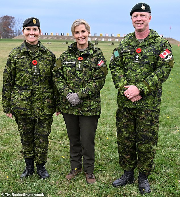 Sophie donned a military uniform as she posed for photos with staff from the Winona Rifle Range