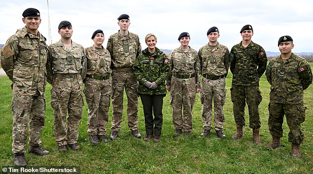 The Duchess matched up with army members yesterday and wore camouflage clothing for the occasion