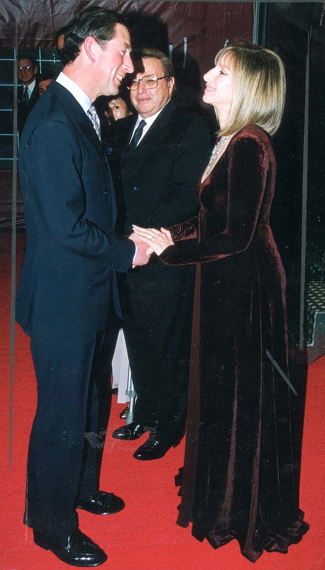 The American singer, 81, was not afraid to reference His Majesty, 74, in her new memoir, My Name is Barbra: The Exhilarating and Startlingly Honest Autobiography of the Living Legend.  The pair are pictured above at Wembley Arena in 1994