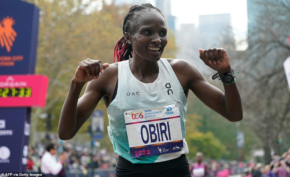 Kenyan Hellen Obiri celebrates winning the 52nd edition of the NYC Marathon.  Her time was 2 hours, 27 minutes and 23 seconds.