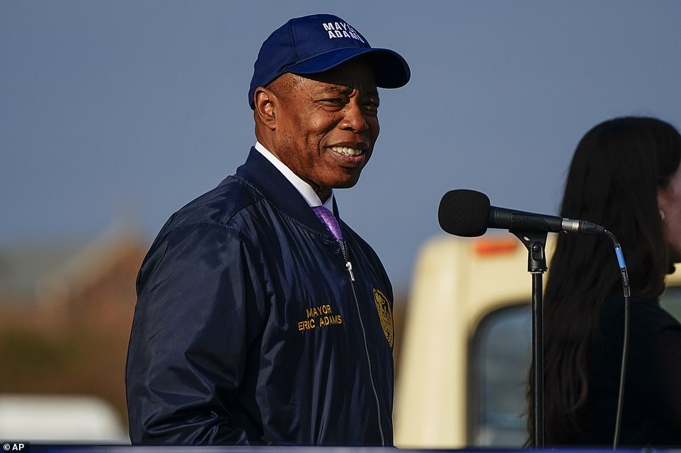 New York City Mayor Eric Adams smiles as he addresses athletes before heading to Verrazano Narrows Bridge