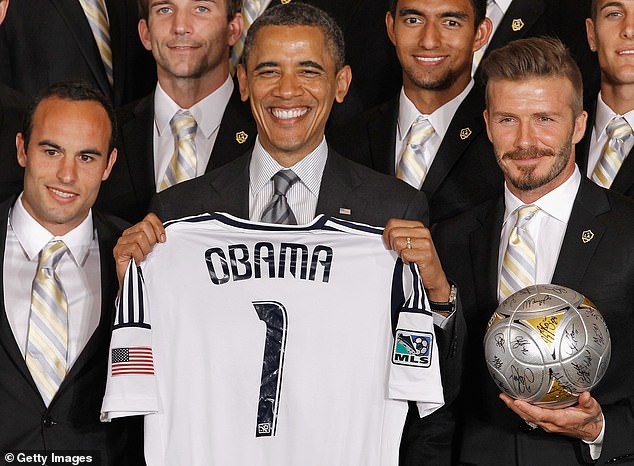 Barack Obama poses for photos at the White House with Major League Soccer champions Los Angeles Galaxy, including Landon Donovan (L) and David Beckham, as he sought re-election in 2012